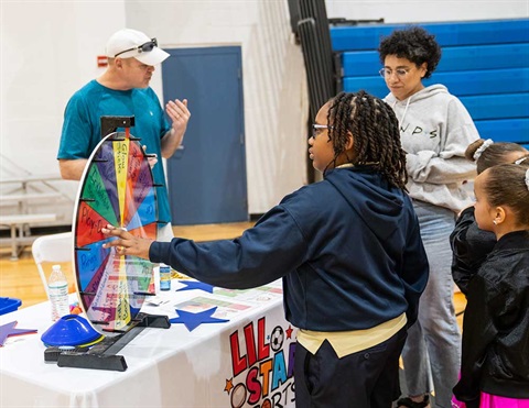 kid spinning wheel