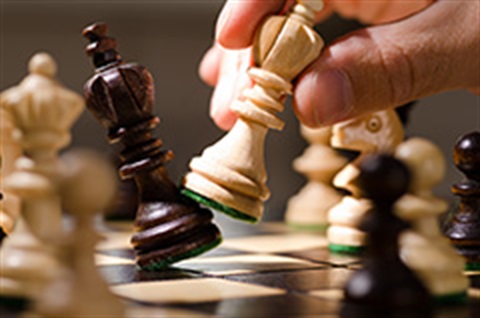 Open Play Chess, chess board with player moving piece