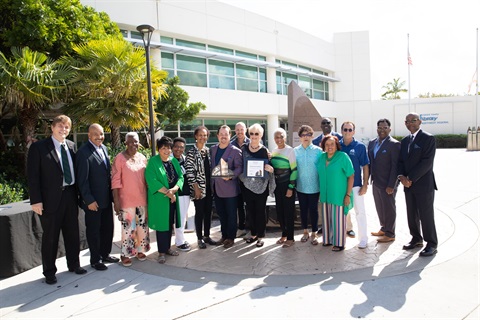 Group of People in front of Northwest Library winners of the MLK Monument for 2022